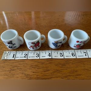 Four Miniature Hello Kitty Mugs